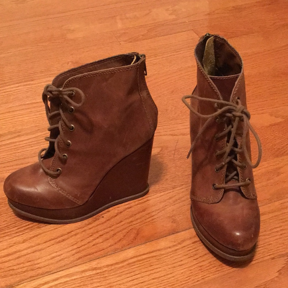Steve Madden brown, leather, wedge-styled boots.